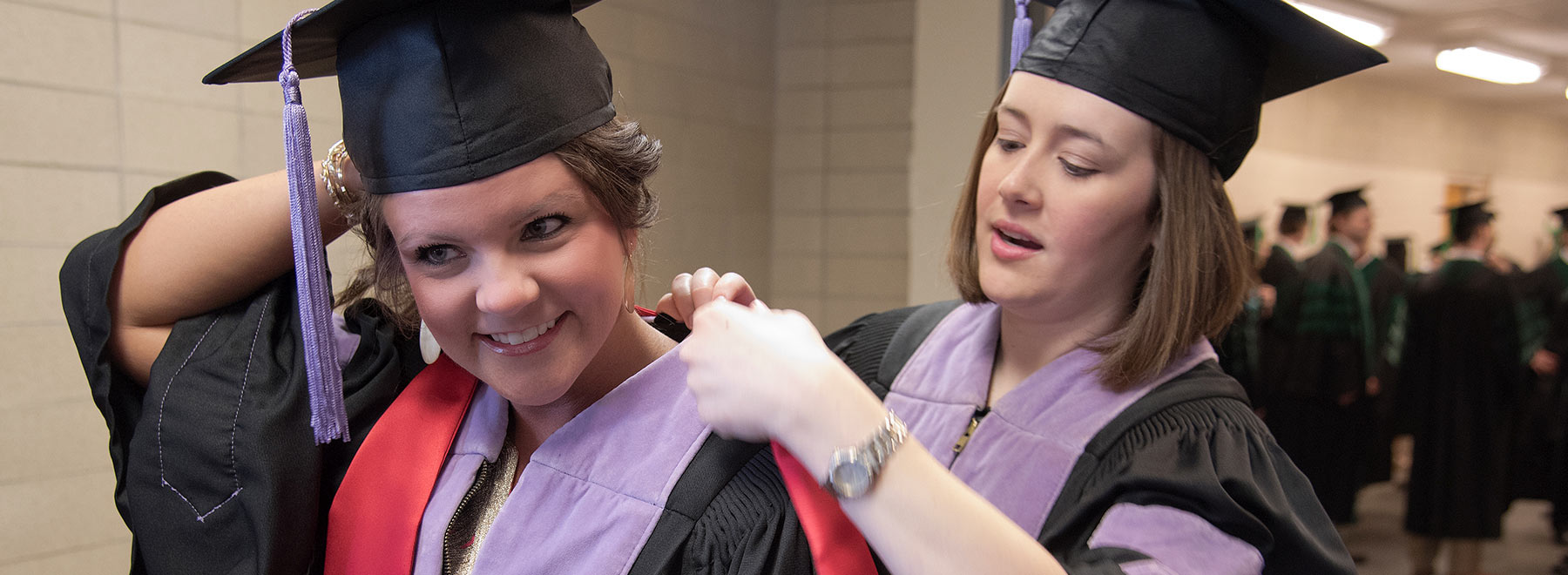 Students preparing for graduation ceremony